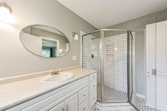 9207 Timberside Dr, Houston, TX 77025 - bathroom featuring a shower stall, vanity, and tile patterned floors