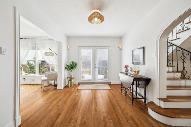 2108 Branard St, Houston, TX 77098 - entrance foyer with stairs, healthy amount of natural light, and wood finished floors