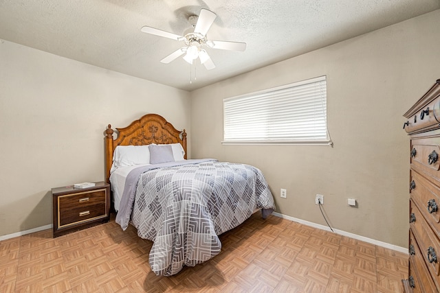 1343 Somercotes Ln, Channelview, TX 77530 - bedroom with a textured ceiling, baseboards, and ceiling fan