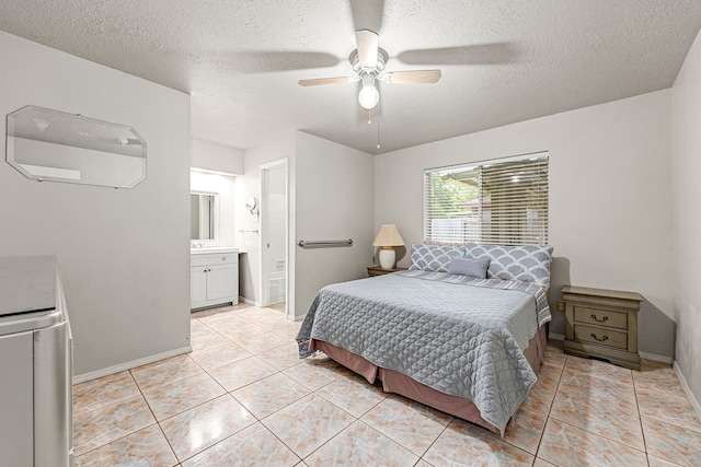 1343 Somercotes Ln, Channelview, TX 77530 - bedroom with baseboards, a textured ceiling, ensuite bath, light tile patterned floors, and ceiling fan
