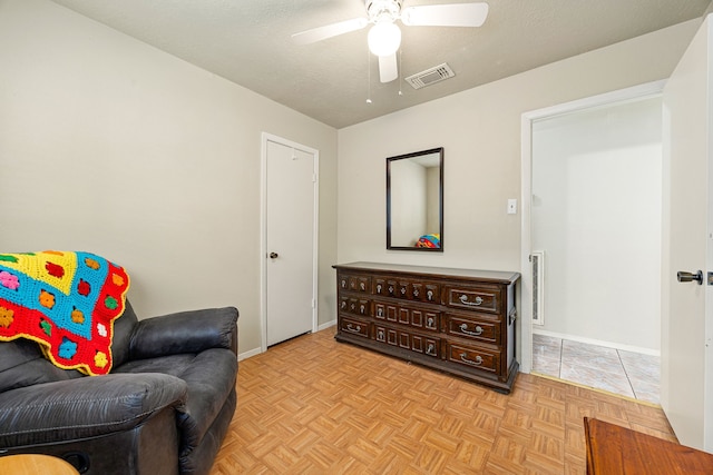 1343 Somercotes Ln, Channelview, TX 77530 - sitting room featuring a ceiling fan and baseboards