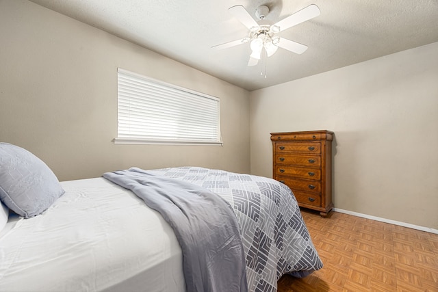 1343 Somercotes Ln, Channelview, TX 77530 - bedroom featuring a ceiling fan and baseboards