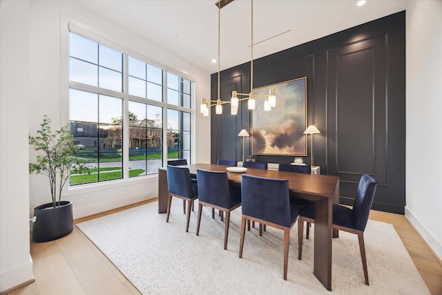 510 Wilmington Dr, Bellaire, TX 77401 - dining space with baseboards, plenty of natural light, light wood-type flooring, and recessed lighting