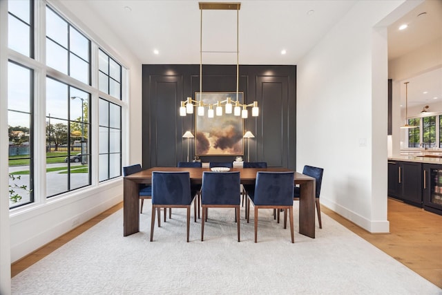 510 Wilmington Dr, Bellaire, TX 77401 - dining space with light wood-type flooring, baseboards, a chandelier, and recessed lighting