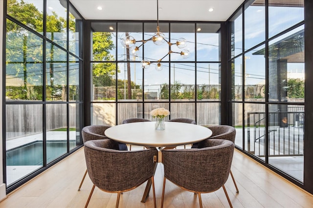 510 Wilmington Dr, Bellaire, TX 77401 - sunroom featuring a chandelier