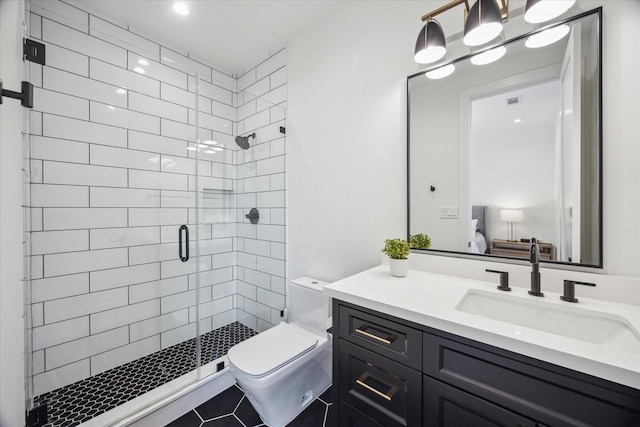 510 Wilmington Dr, Bellaire, TX 77401 - bathroom featuring vanity, a shower stall, toilet, and tile patterned flooring