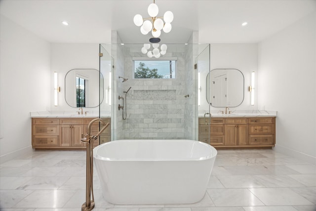 510 Wilmington Dr, Bellaire, TX 77401 - bathroom with marble look tiles, a stall shower, a freestanding bath, baseboards, and recessed lighting