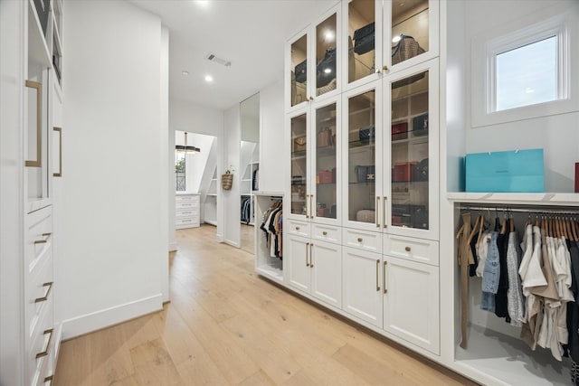 510 Wilmington Dr, Bellaire, TX 77401 - hall featuring light wood-style floors, baseboards, and recessed lighting
