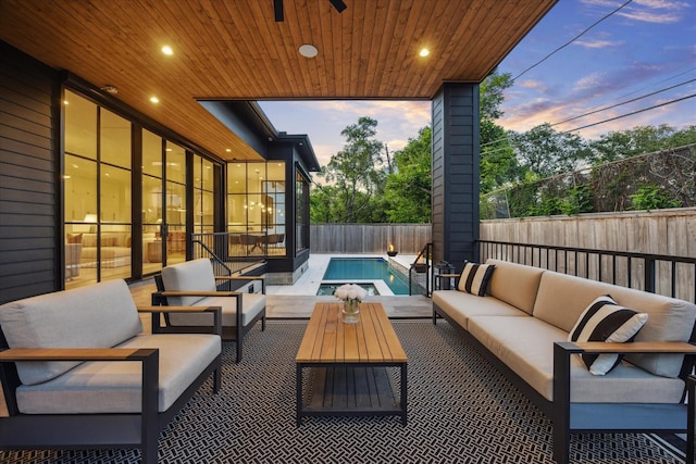 510 Wilmington Dr, Bellaire, TX 77401 - fenced backyard featuring an outdoor hangout area, a ceiling fan, and a patio area