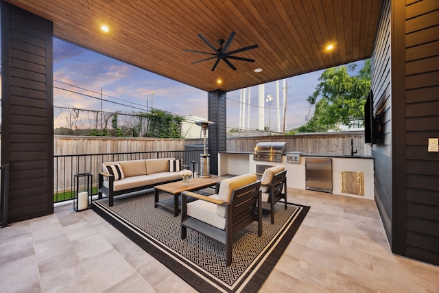 510 Wilmington Dr, Bellaire, TX 77401 - patio terrace at dusk featuring an outdoor living space, ceiling fan, and a patio area