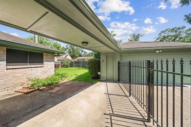 3811 Riverwood Park Dr, Houston, TX 77345 - view of patio with a garage