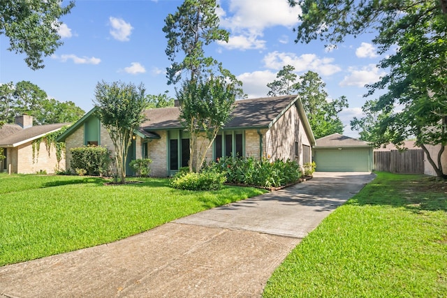 3811 Riverwood Park Dr, Houston, TX 77345 - mid-century modern home featuring brick siding, a detached garage, an outdoor structure, and roof with shingles