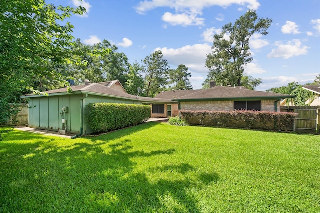 3811 Riverwood Park Dr, Houston, TX 77345 - rear view of house featuring brick siding and a chimney
