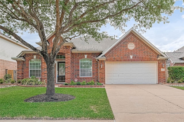 11519 Staffordale Ct, Cypress, TX 77433 - traditional home with brick siding, an attached garage, concrete driveway, and a front yard