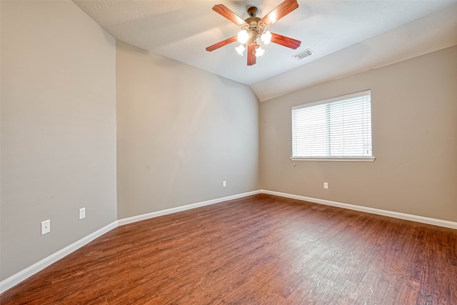 11519 Staffordale Ct, Cypress, TX 77433 - spare room with wood finished floors, baseboards, a ceiling fan, and vaulted ceiling