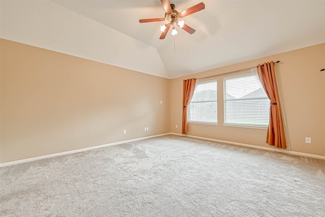 11519 Staffordale Ct, Cypress, TX 77433 - empty room featuring light colored carpet, ceiling fan, vaulted ceiling, and baseboards