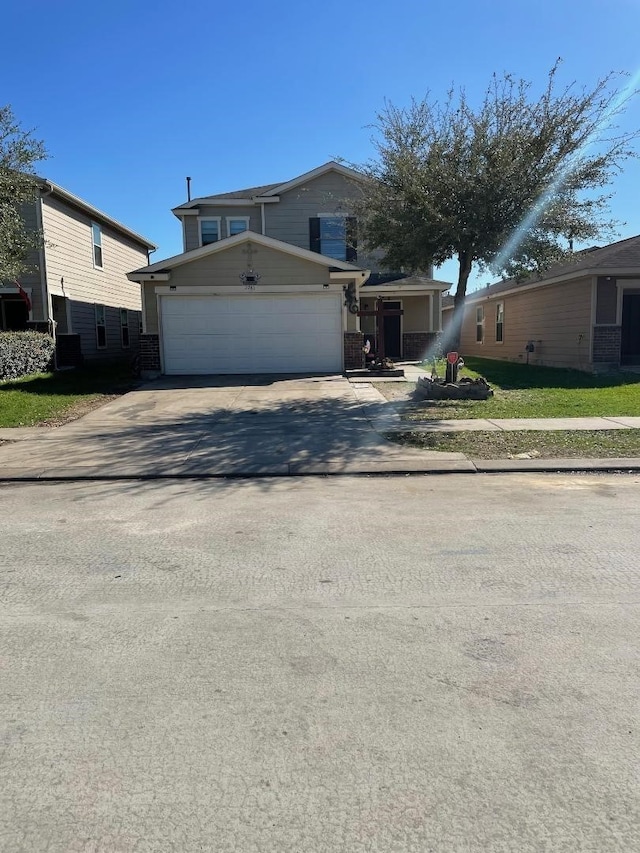 2743 Oriole Wood Ct, Houston, TX 77038 - view of front of home featuring concrete driveway and a garage
