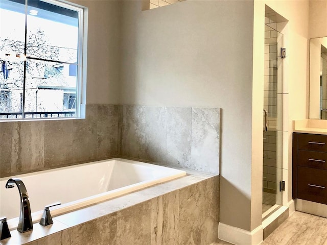 1920 Pueblo Nuevo Path, Houston, TX 77077 - bathroom featuring vanity, a bath, and a shower stall