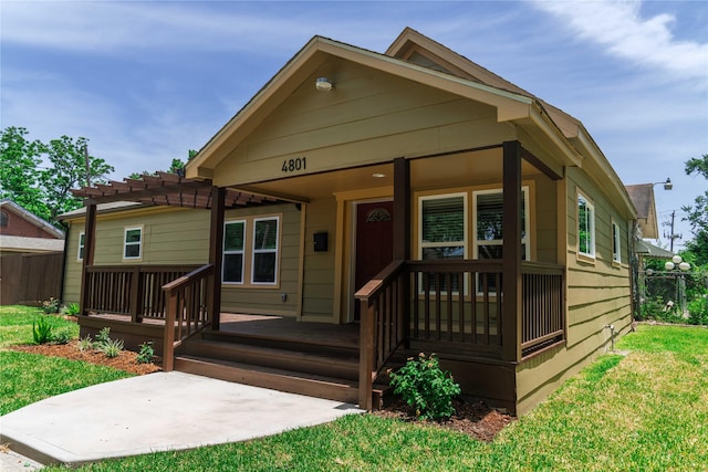 4801 Walker St, Houston, TX 77023 - view of front of home featuring a pergola