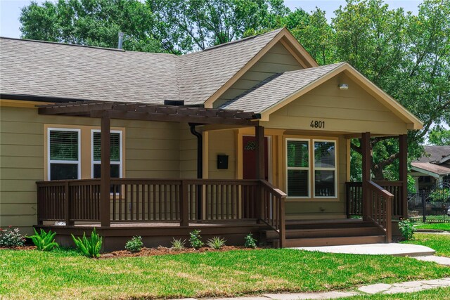 4801 Walker St, Houston, TX 77023 - bungalow with a shingled roof and a front yard