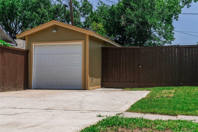 4801 Walker St, Houston, TX 77023 - garage with driveway and a gate