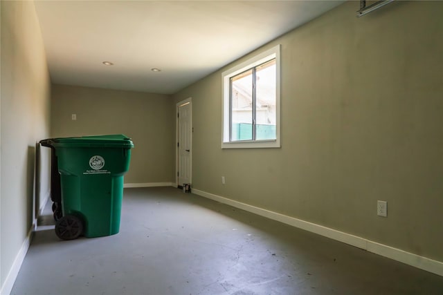 4801 Walker St, Houston, TX 77023 - unfurnished room with unfinished concrete floors and baseboards