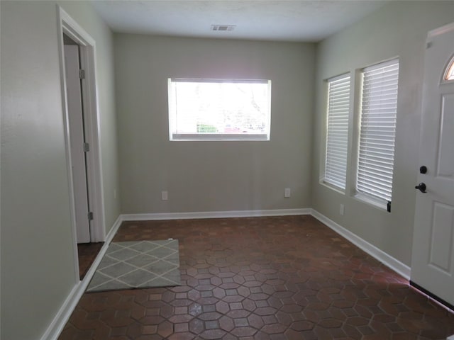 4801 Walker St, Houston, TX 77023 - foyer entrance featuring baseboards