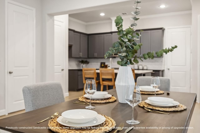833 Fisher St Unit C, Houston, TX 77018 - dining space with recessed lighting, wood finished floors, and crown molding