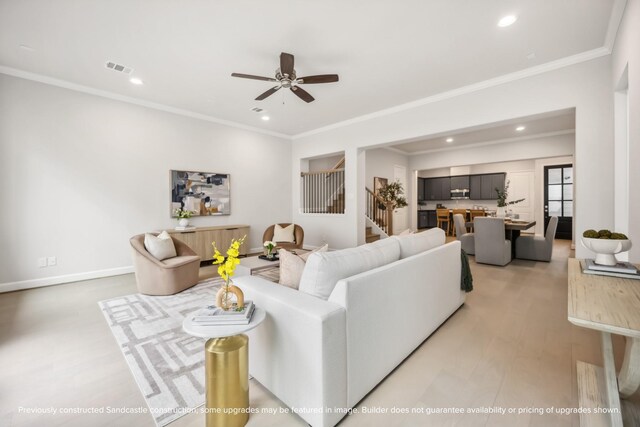 833 Fisher St Unit C, Houston, TX 77018 - living area featuring stairway, ornamental molding, a ceiling fan, recessed lighting, and baseboards