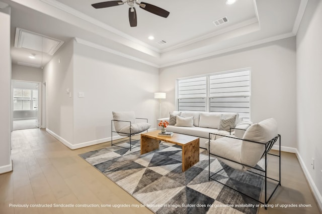 833 Fisher St Unit C, Houston, TX 77018 - living room featuring attic access, a ceiling fan, baseboards, a raised ceiling, and wood finished floors