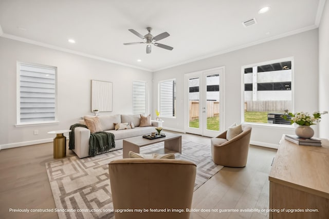 833 Fisher St Unit C, Houston, TX 77018 - living room with light wood finished floors, ceiling fan, baseboards, ornamental molding, and recessed lighting