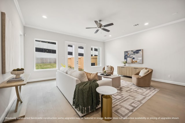 833 Fisher St Unit C, Houston, TX 77018 - living area featuring light wood-type flooring, french doors, ceiling fan, ornamental molding, and baseboards