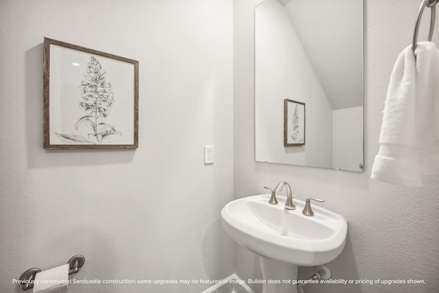 833 Fisher St Unit C, Houston, TX 77018 - bathroom featuring vaulted ceiling and a sink