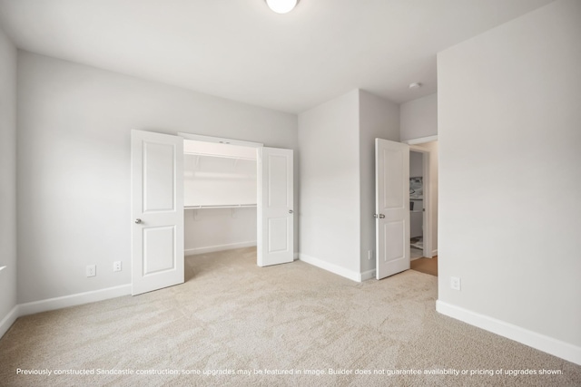 833 Fisher St Unit C, Houston, TX 77018 - unfurnished bedroom featuring carpet floors, baseboards, a walk in closet, and a closet