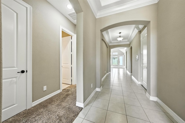 4914 Fairford Dr, Sugar Land, TX 77479 - hallway with ornamental molding, arched walkways, and light tile patterned floors