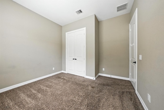 4914 Fairford Dr, Sugar Land, TX 77479 - unfurnished bedroom with dark carpet and a closet