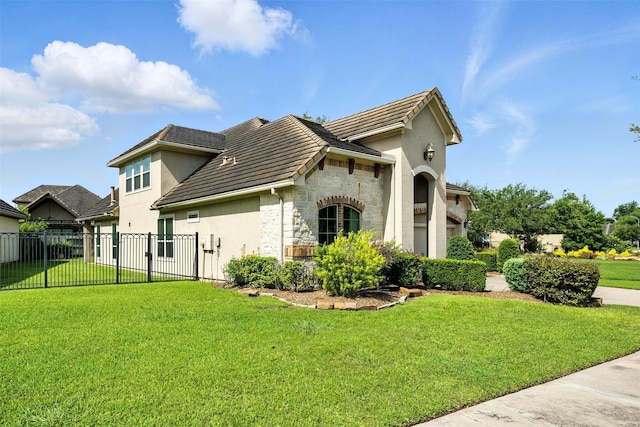 4914 Fairford Dr, Sugar Land, TX 77479 - view of side of property with stone siding, stucco siding, and a tiled roof