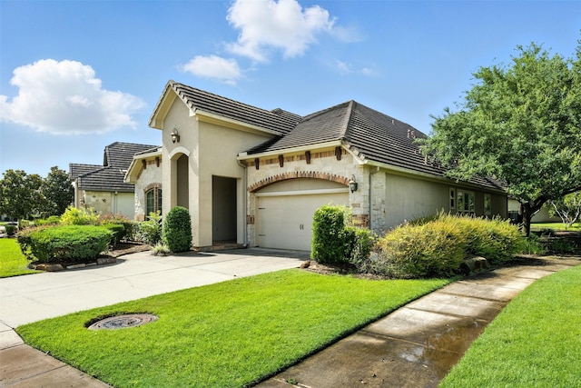 4914 Fairford Dr, Sugar Land, TX 77479 - view of front facade featuring driveway, an attached garage, a front yard, a tile roof, and stone siding