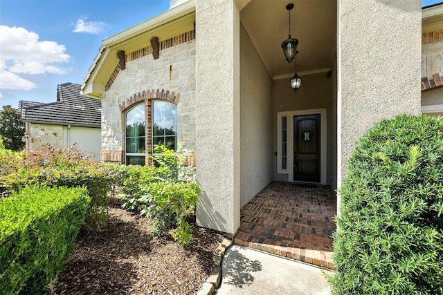 4914 Fairford Dr, Sugar Land, TX 77479 - doorway to property featuring stucco siding and stone siding