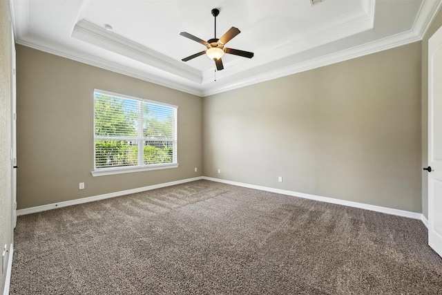 4914 Fairford Dr, Sugar Land, TX 77479 - carpeted spare room featuring a tray ceiling, ornamental molding, and ceiling fan