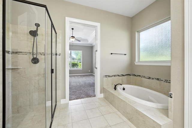 4914 Fairford Dr, Sugar Land, TX 77479 - bathroom featuring a bath, a shower stall, ornamental molding, a ceiling fan, and tile patterned floors