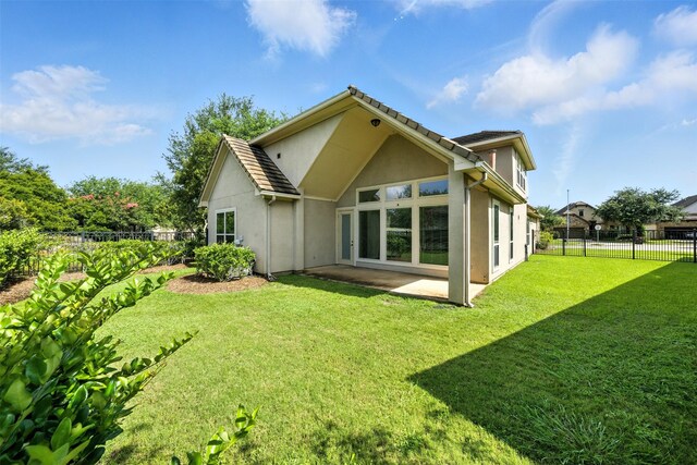 4914 Fairford Dr, Sugar Land, TX 77479 - back of house with stucco siding and a patio area