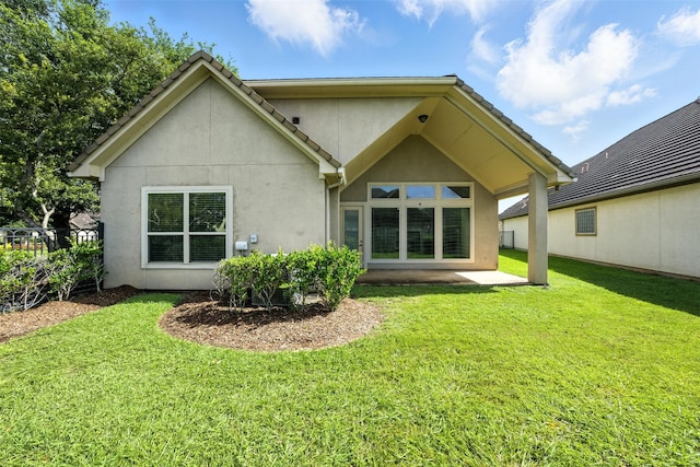 4914 Fairford Dr, Sugar Land, TX 77479 - rear view of property with stucco siding and a patio area