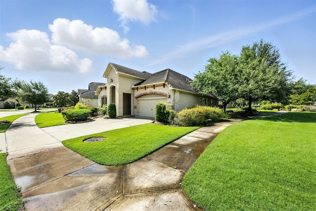 4914 Fairford Dr, Sugar Land, TX 77479 - view of front of house featuring a front lawn, driveway, an attached garage, stucco siding, and a tiled roof