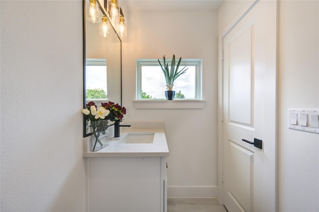 2312 Reinerman St, Houston, TX 77007 - bathroom featuring vanity and baseboards