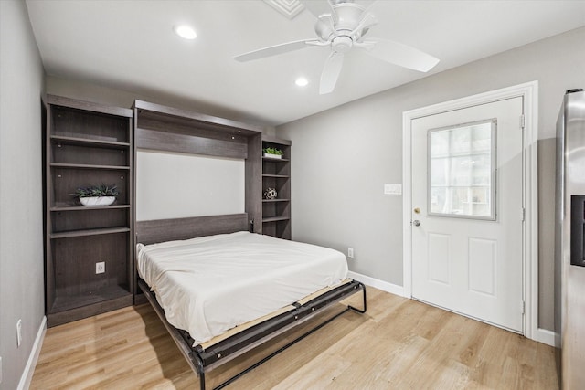 2050 Marnel Rd, Houston, TX 77055 - bedroom with baseboards, light wood-type flooring, recessed lighting, and a ceiling fan