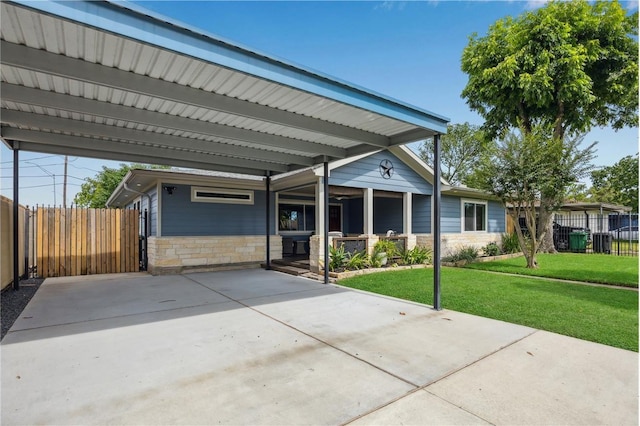 2050 Marnel Rd, Houston, TX 77055 - view of front of home with stone siding, covered porch, and an attached carport