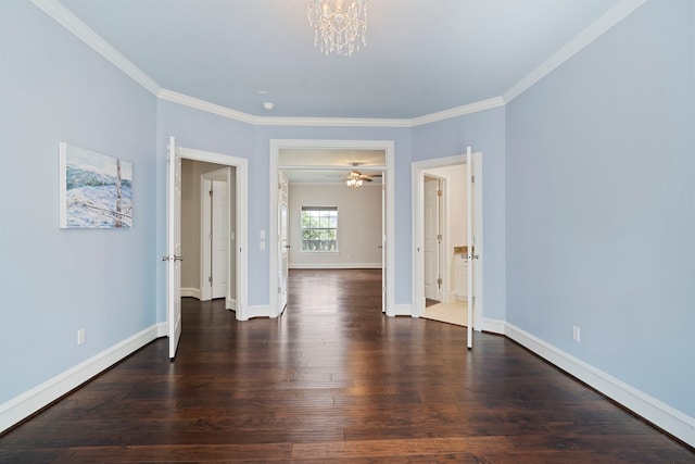 26 Commanders Pt, Missouri City, TX 77459 - spare room with ornamental molding, a chandelier, wood finished floors, and baseboards