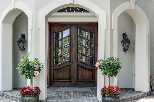 26 Commanders Pt, Missouri City, TX 77459 - doorway to property featuring french doors and stucco siding
