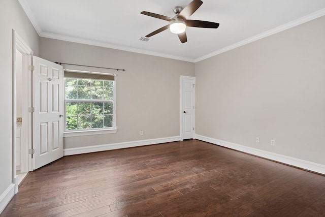 26 Commanders Pt, Missouri City, TX 77459 - spare room with dark wood-style flooring, crown molding, a ceiling fan, and baseboards
